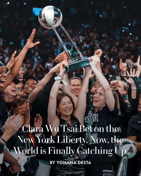 This ad shows an image of a team holding up a trophy.