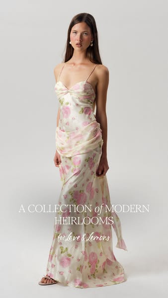 The ad showcases a For Love & Lemons dress, emphasizing its modern heirloom design. It features a model in a light,