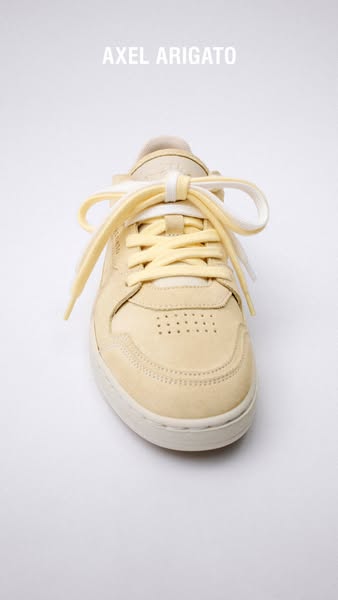 This ad focuses on highlighting the Axel Arigato sneaker with a high quality image. The focal point is the product itsel