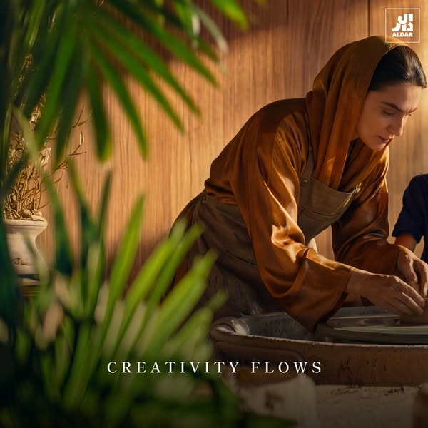 This image ad conveys a sense of the creativity that living in an Aldar property can unlock. It features a woman craftin