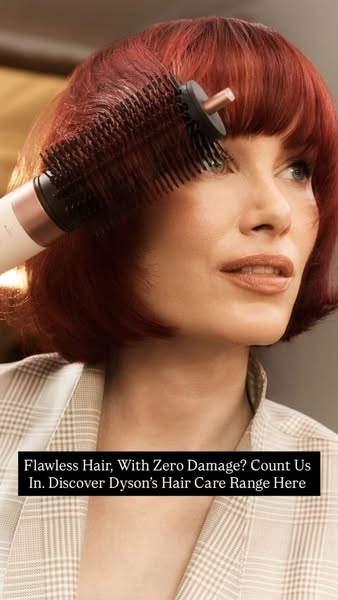 This ad showcases the Dyson hair care range by showing the Dyson Airwrap being used to style the model's hair. It me