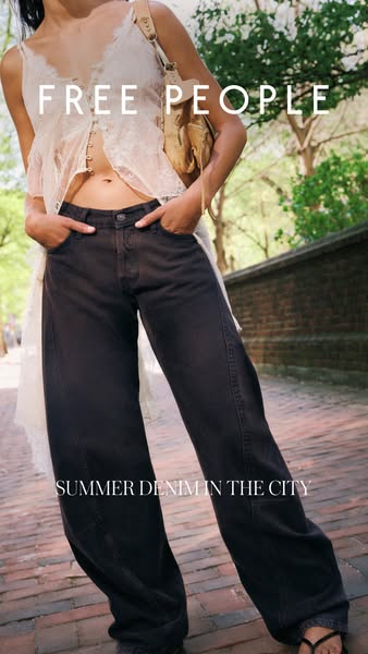 This ad showcases a pair of wide-leg denim jeans from Free People, emphasizing their suitability for summer in the city.