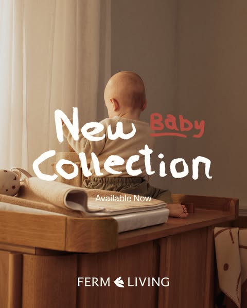 The ad is for Ferm Living's new baby collection and shows the back of a baby sitting at the edge of a changing table