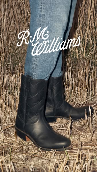 The ad showcases a pair of R.M. Williams boots. It has a simple and direct visual style with the brand name prominently 