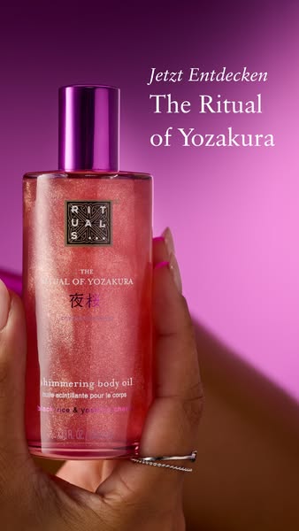 This ad promotes The Ritual of Yozakura shimmering body oil by Rituals. The ad features a close-up shot of the product b