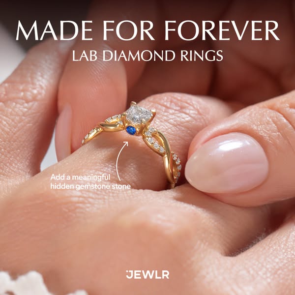 The image ad showcases a JEWLR lab diamond ring on a hand and highlights the option to add a meaningful hidden gemstone.