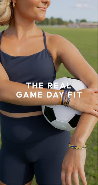 This ad promotes bracelets as a way to display team spirit on game day. The ad features a woman wearing a matching activ