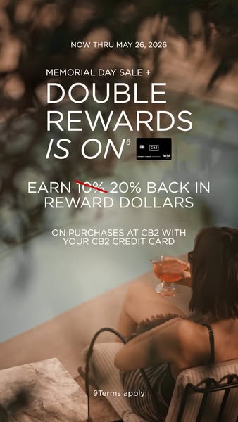 The ad promotes the CB2 credit card, highlighting a limited-time offer of double rewards. The visual of a woman relaxing