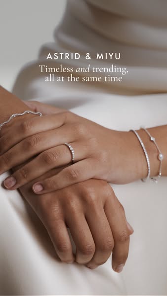 This ad showcases Astrid & Miyu jewelry, emphasizing that it is both timeless and on-trend. The image features a clo