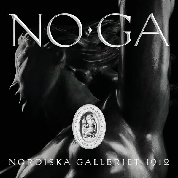 This image ad features the NOGA brand logo above a classical sculpture, blending artistry with brand identity.