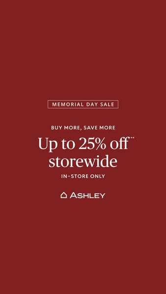 This single image ad from Ashley promotes a Memorial Day sale offering up to 25% off storewide. The ad focuses on drivin
