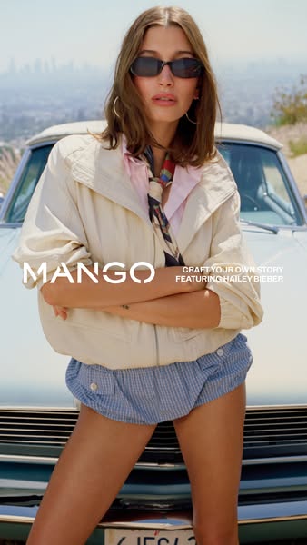 This ad showcases the Mango brand featuring Hailey Bieber standing in front of a car, wearing various clothing items, an