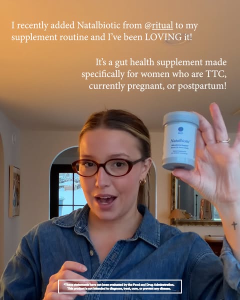 A woman is holding Ritual's Natalbiotic product and attests that she has recently added the product to her supplemen