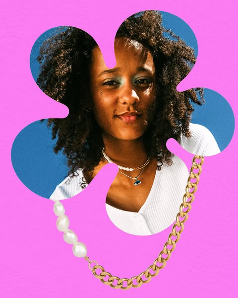 An ad featuring a woman wearing two necklaces. The ad is designed with a cutout in the shape of a flower. The flower is 