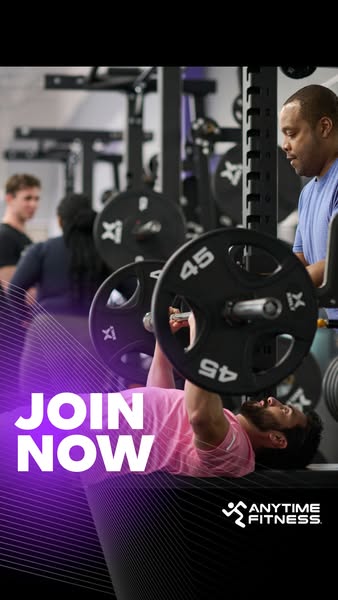 This ad encourages the viewer to join Anytime Fitness with a high-energy image of someone bench-pressing with a spotter 