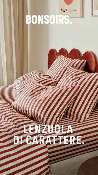 An image ad displaying red-and-white striped bedding.