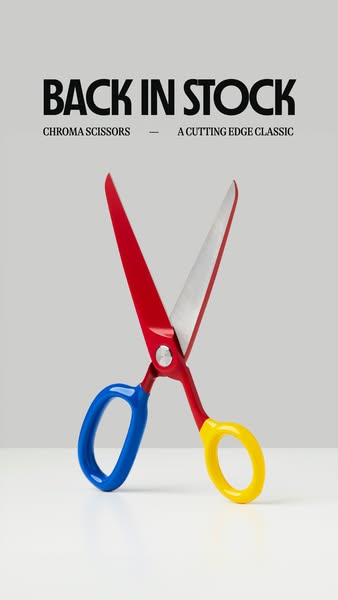 This ad features a simple product shot of Chroma Scissors against a gray background. The scissors are colorful, with a r