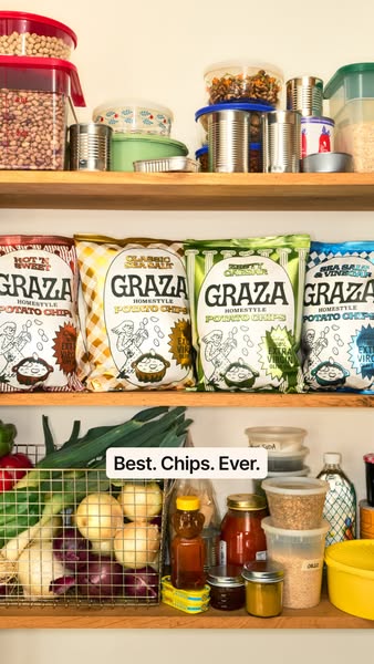 Image ad for Graza chips featuring various chip flavors arranged on a shelf next to a variety of food items. The ad'