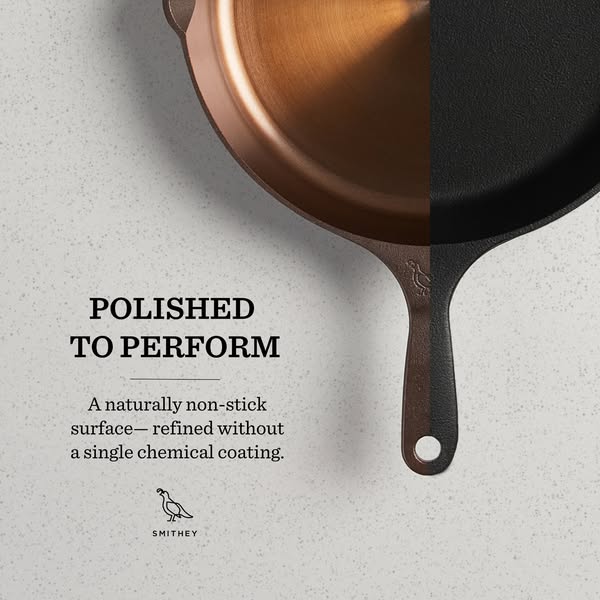 This ad showcases a close-up of a Smithey cast iron skillet, split between a polished interior and a dark exterior. It h