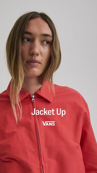This ad features a woman wearing a Vans jacket against a plain backdrop. The focal point is the jacket, with the brand n