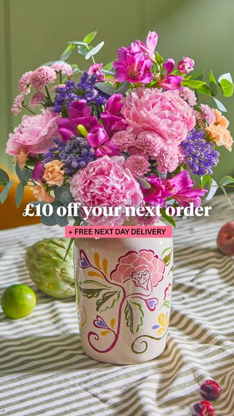 This image ad for a flower delivery service promotes £10 off the customer's next order, plus free next day delivery.