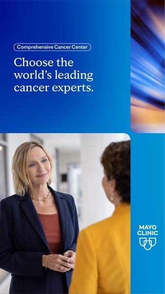 This ad is for Mayo Clinic's Comprehensive Cancer Center. The ad features an image of two women in business professi