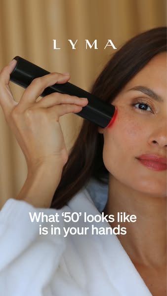 This ad features a woman using the LYMA laser on her face. The ad's headline suggests that the appearance of aging i