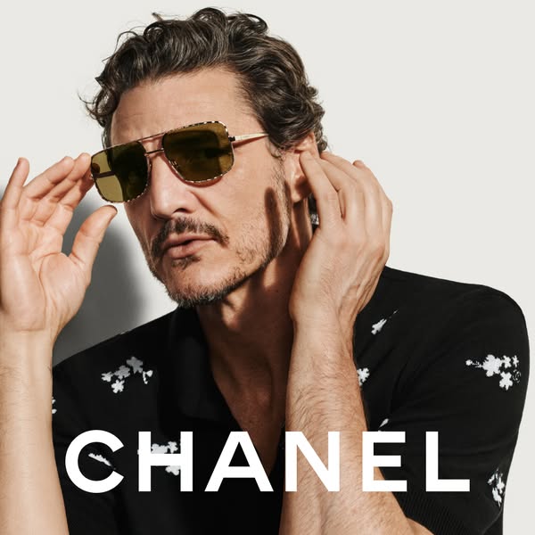 Image ad featuring a man wearing Chanel sunglasses.