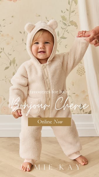 This ad features a baby wearing a hooded onesie. The ad promotes the brand Jamie Kay and features the text "Bonjour