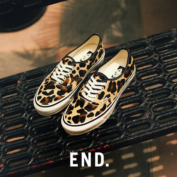 An image ad showcasing Vans brand shoes with a leopard print pattern. The ad includes the text 'END.' in the low