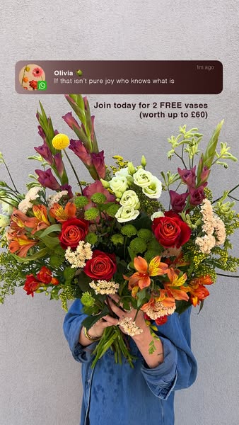 This image ad features a person holding a large bouquet of flowers with a message bubble above and an offer below.