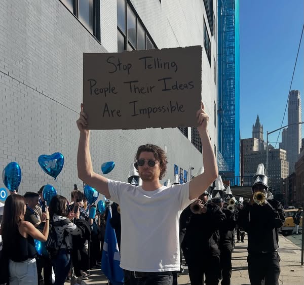 DudewithSign ad