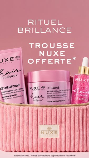 Image ad for NUXE haircare products, highlighting a free NUXE toiletry bag with purchase.