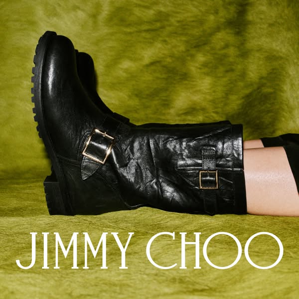This ad showcases a pair of Jimmy Choo biker boots on a green background. The brand name is prominently displayed at the