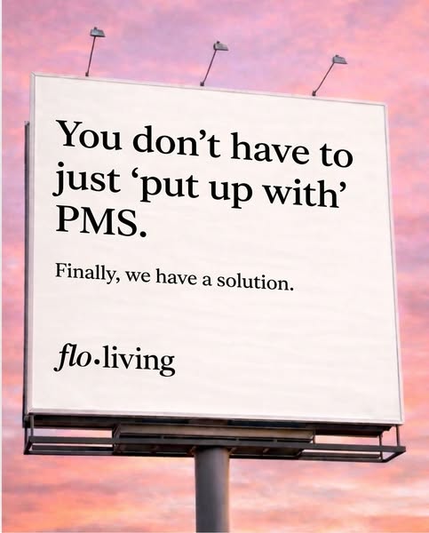 A billboard ad for Flo Living. The ad states, "You don't have to just 'put up with' PMS. Finally, we ha