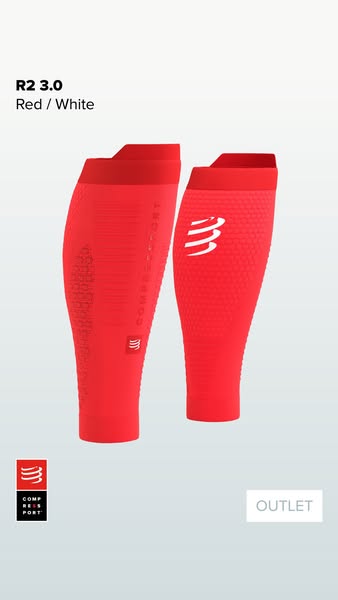 This ad features a product display of Compressport R2 3.0 red and white compression sleeves.