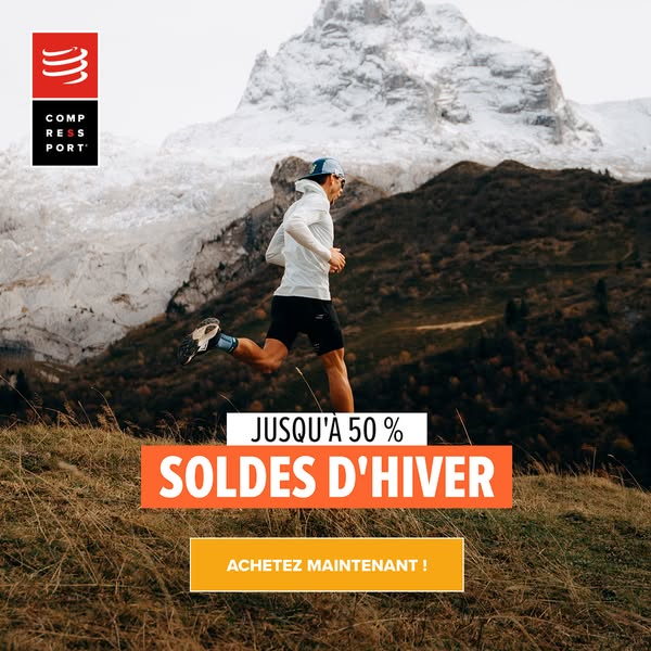 This image ad for Compressport features a man running in a mountainous landscape. The ad promotes a sale of up to 50% of