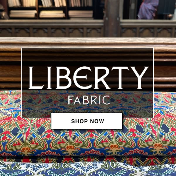 This is a product advertisement from Liberty Fabrics that showcases their fabric and encourages users to shop now.