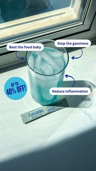 An advertisement featuring Beam Biotic powder supplement, highlighting benefits such as easing gassiness, reducing infla