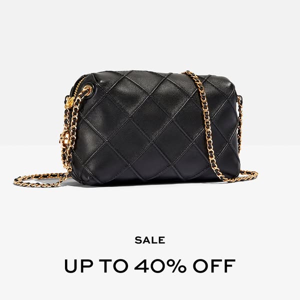 The image features a black quilted handbag with a gold chain strap against a solid white backdrop. The ad promotes a sal