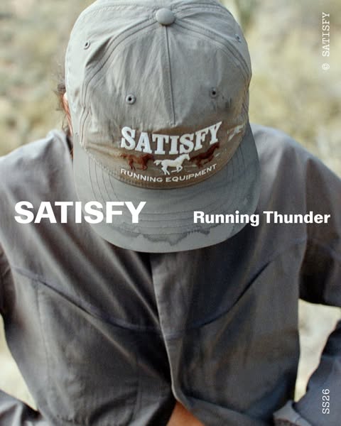 This ad features the athletic brand Satisfy. The brand name is prominently displayed with the tagline "Running Thun