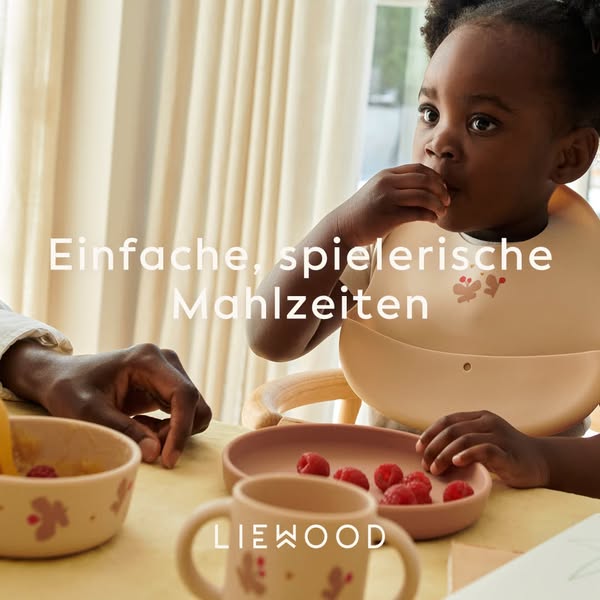 This ad features a child using LieWood brand mealtime products. The ad is attempting to convey a message of simple, play