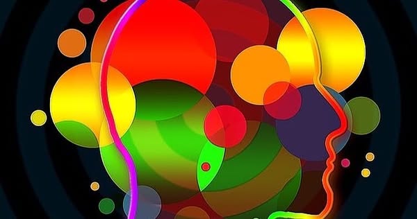 This ad features an abstract image of a head in profile surrounded by colorful circles.