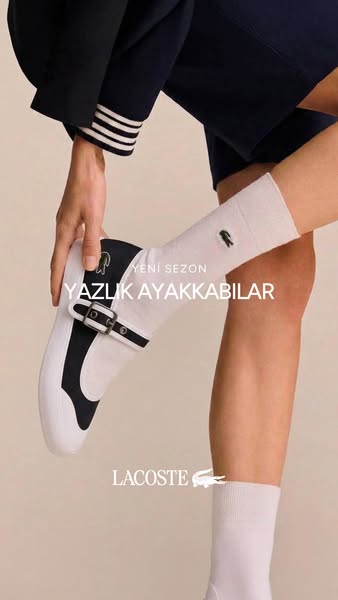 This image ad by Lacoste features a person putting on a white and black slip-on shoe with a buckled strap. The ad showca