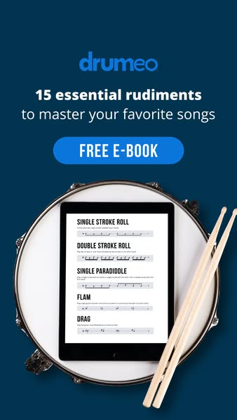 This image ad for Drumeo promotes a free ebook with 15 essential rudiments for mastering songs, targeting drummers looki