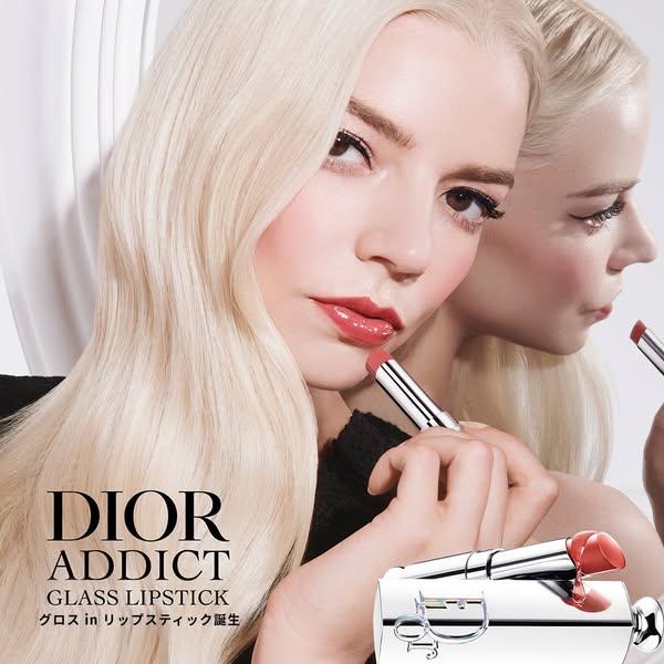 Anya Taylor Joy applies Dior Addict Glass Lipstick in an image ad for the product.