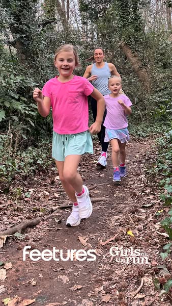 An image shows a woman and two young girls running in the woods to promote Feeture socks.