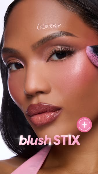 This is an image ad for ColourPop's Blush Stix. The ad features a model with blush applied to her cheekbones. The te
