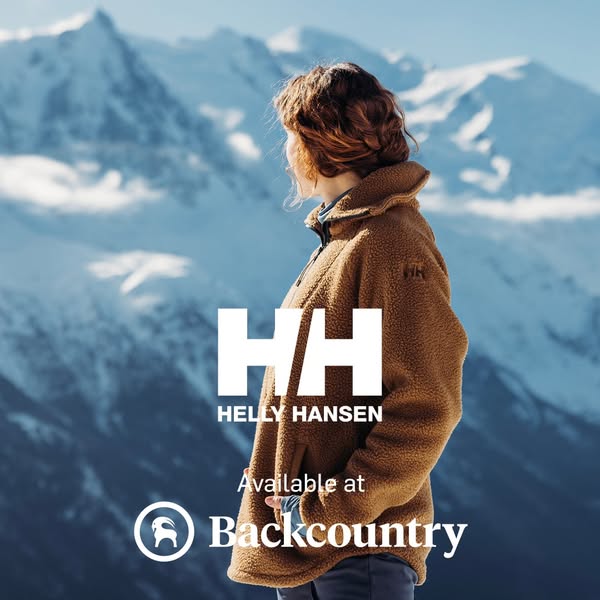 This ad features a woman wearing a Helly Hansen fleece jacket in front of a snowy mountain backdrop. The ad promotes the