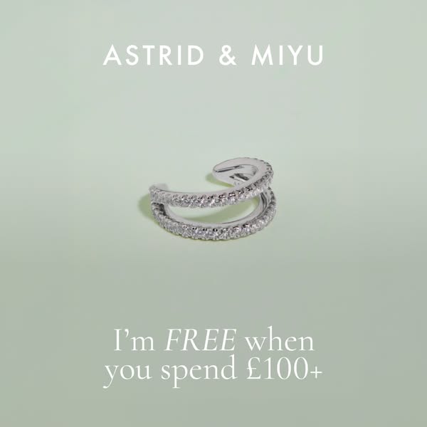 This ad showcases Astrid & Miyu jewelry, promoting an incentive to spend £100+ to get a free item.